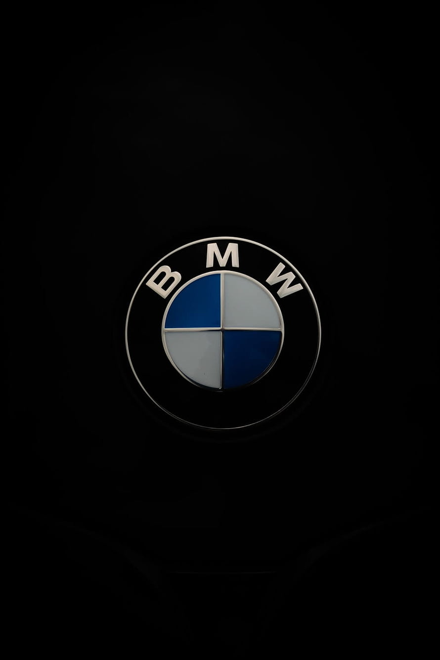 BMW Emblem Close-Up on Black Background with Blue and White Quadrants HD phone wallpaper