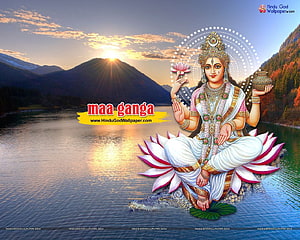 Maa Ganga Seated on Lotus in Himalayan Lake at Sunrise with Sacred Pot and Lotus Flower HD wallpaper