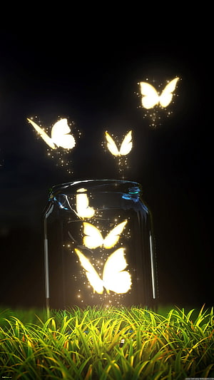 Glowing Butterflies Escaping a Glass Jar in Lush Green Grass at Night HD phone wallpaper