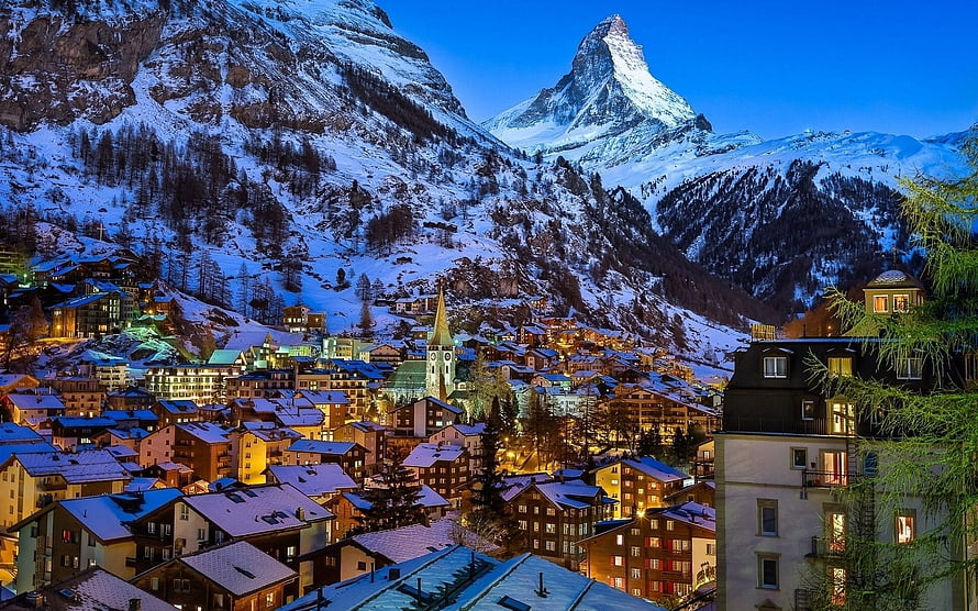 Zermatt Village at Dusk with the Matterhorn Peak in Winter HD wallpaper