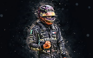 Lewis Hamilton in Mercedes Petronas Racing Suit with Victory Fist Pump HD wallpaper