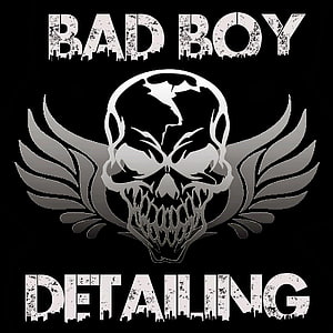 Bad Boy Detailing Skull and Wings Logo Design on Black Background HD phone wallpaper