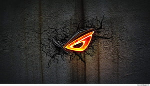 ASUS TUF Gaming Logo Glowing on Cracked Concrete Wall HD wallpaper