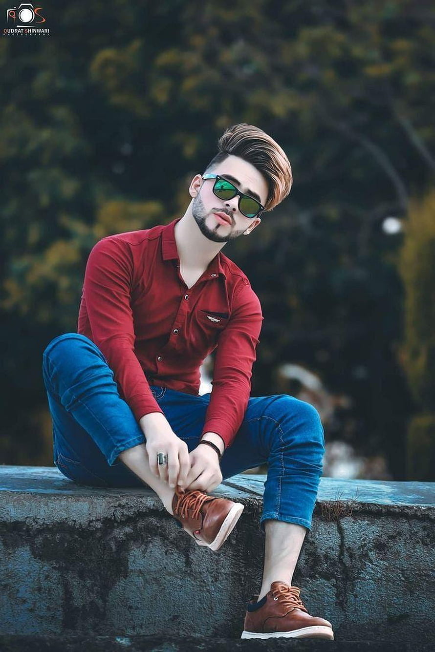 Stylish Young Man in Red Shirt and Sunglasses Sitting on Stone Wall HD phone wallpaper