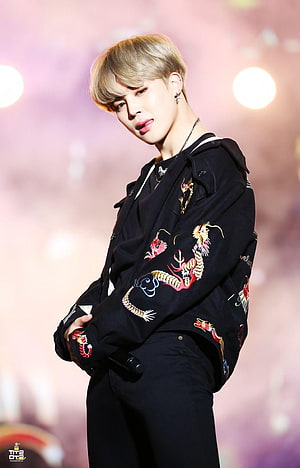 Jimin from BTS in a black embroidered dragon jacket with blonde hair on stage HD phone wallpaper