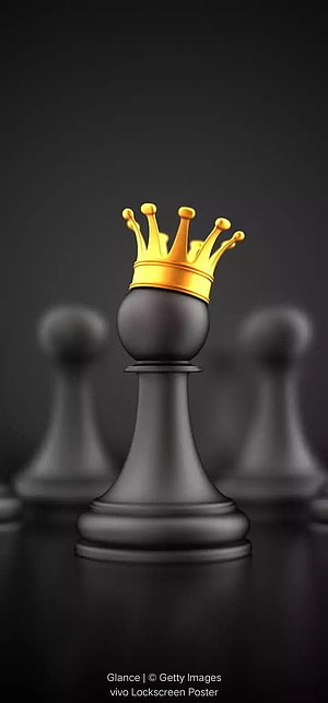 Black Chess King with Golden Crown Standing Before Blurred Pawns on Dark Background HD phone wallpaper