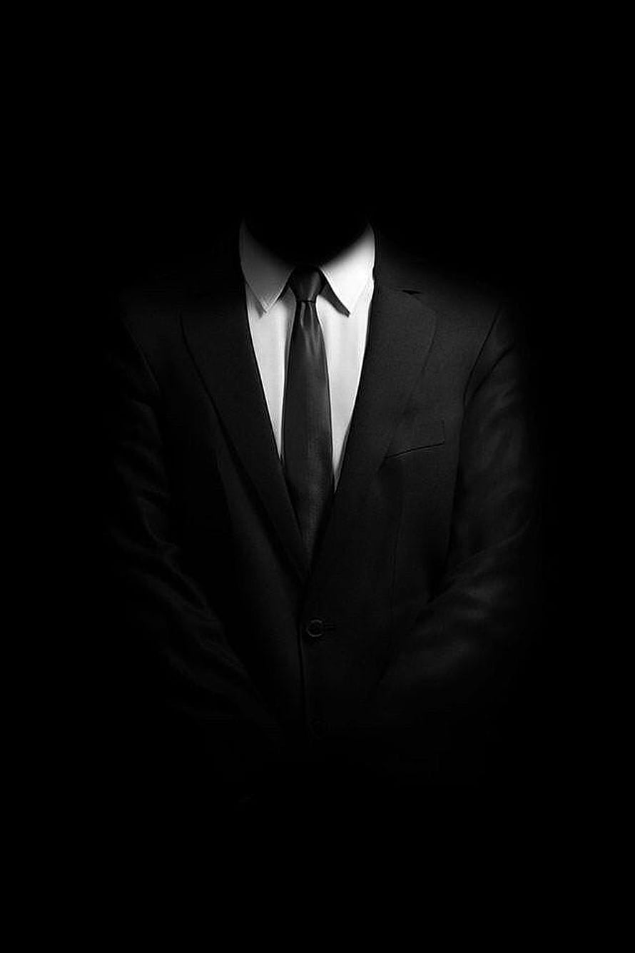 Faceless Man in Black Suit and Tie Emerging from Darkness HD phone wallpaper