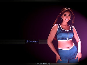 Simran in a Blue Two-Piece Outfit with White Trim Against a Dark Background HD wallpaper