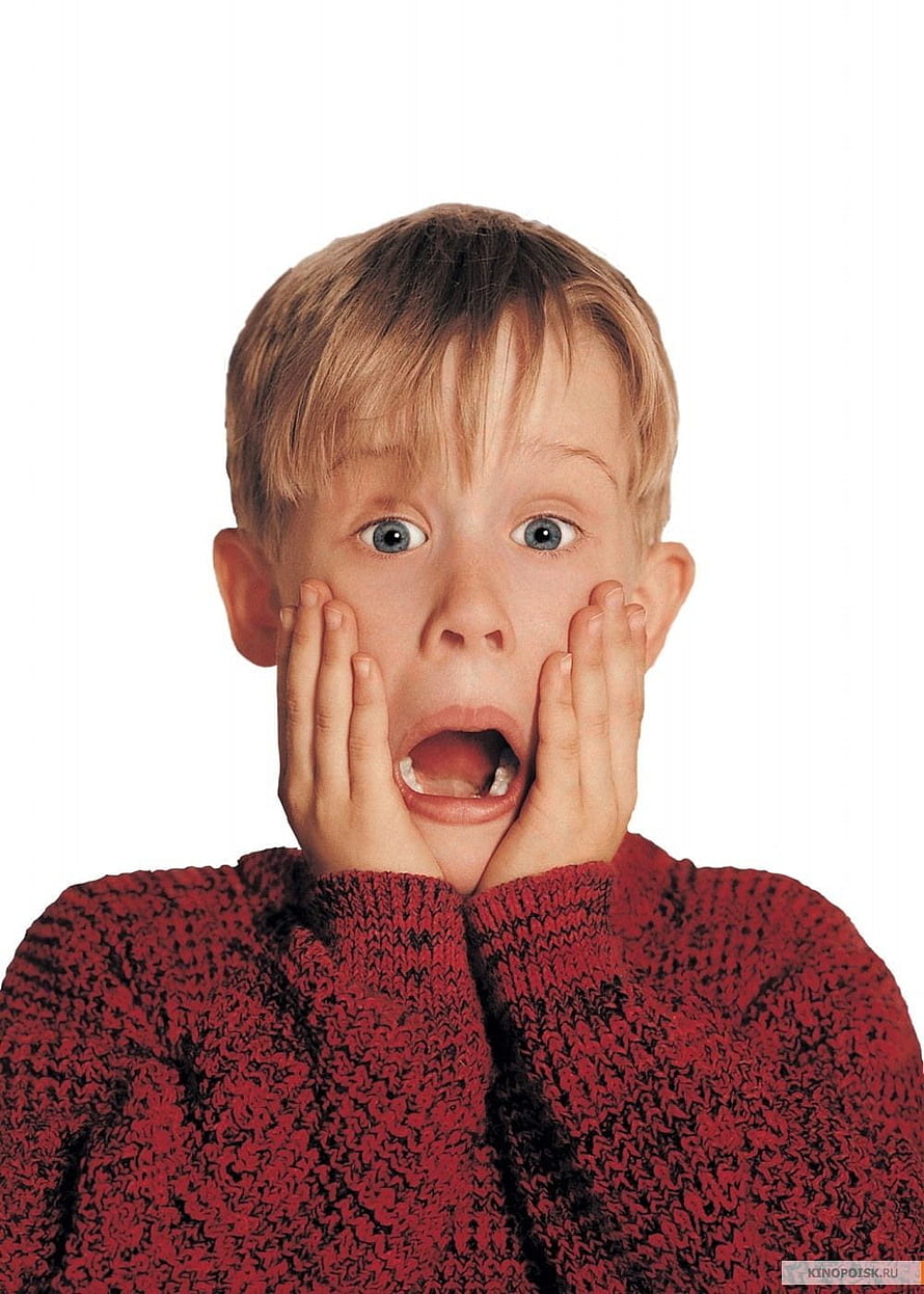 Kevin McCallister from Home Alone in a red sweater with a shocked expression HD phone wallpaper