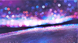 Vibrant Purple and Blue Bokeh Light Abstraction with Glittering Sparkle Texture HD wallpaper