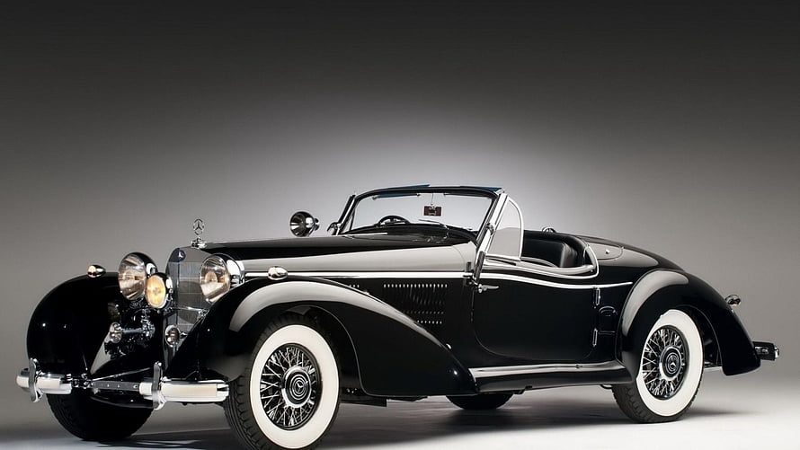 Black 1930s Mercedes-Benz 500K Roadster with White Wall Tires HD wallpaper