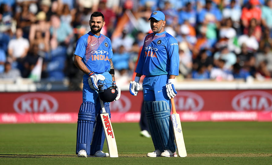 Virat Kohli and MS Dhoni in India Cricket Team Blue ODI Uniforms on the Field HD wallpaper