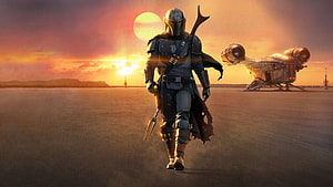 The Mandalorian walking across a desert at sunset with a spaceship in the background HD wallpaper