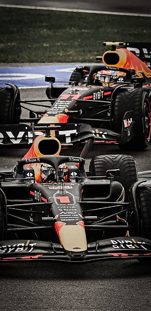 Red Bull Racing Formula 1 Cars Leading On Wet Track HD phone wallpaper