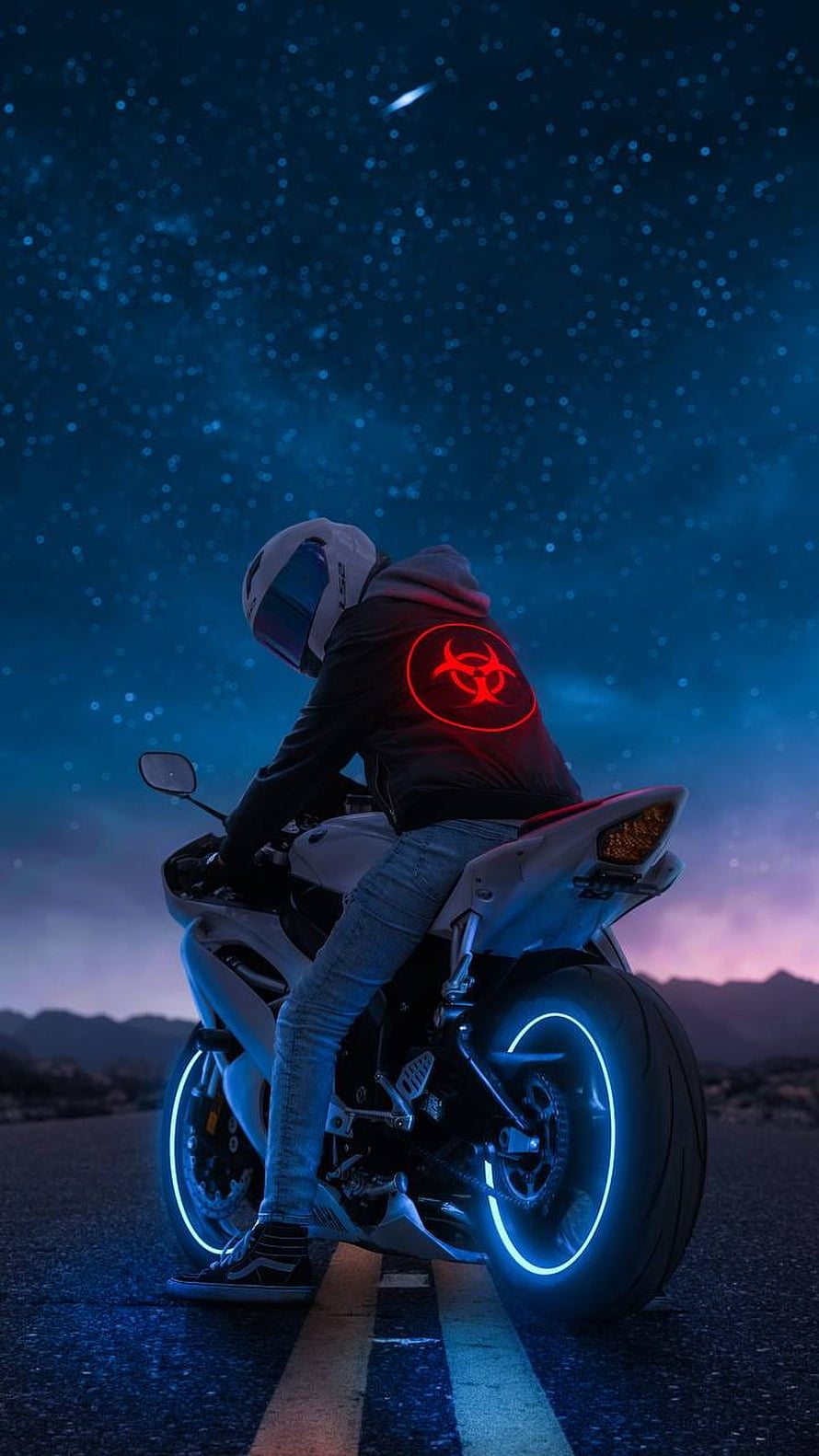Biker on a Neon-Lit Sport Motorcycle Under a Starry Night Sky HD phone wallpaper
