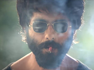 Shahid Kapoor as Kabir Singh in a moody close-up with sunglasses and cigarette smoke HD wallpaper