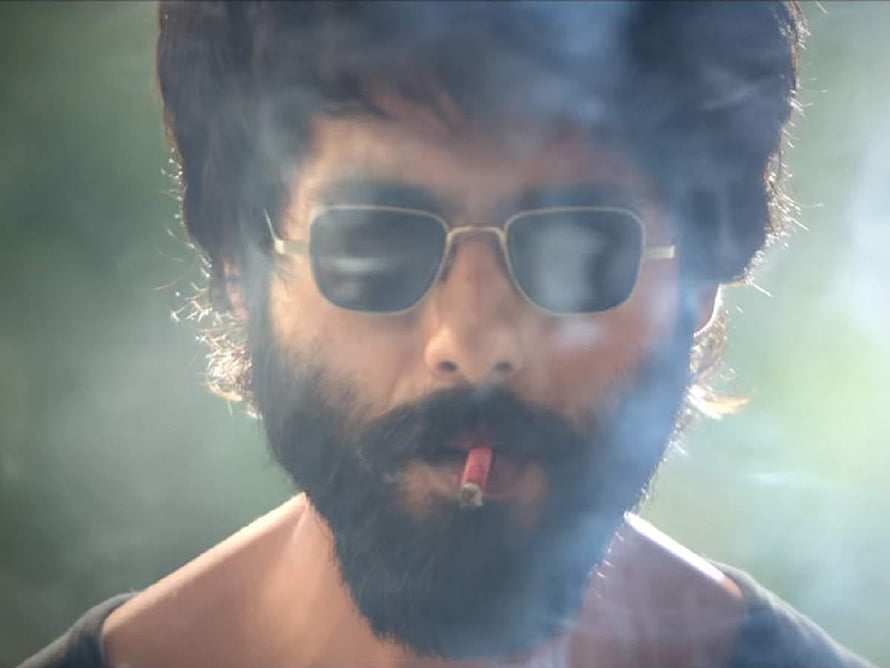 Shahid Kapoor as Kabir Singh in a moody close-up with sunglasses and cigarette smoke HD wallpaper