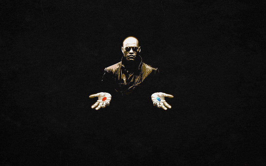 Morpheus from The Matrix holding the red and blue pills in a dark cinematic scene HD wallpaper