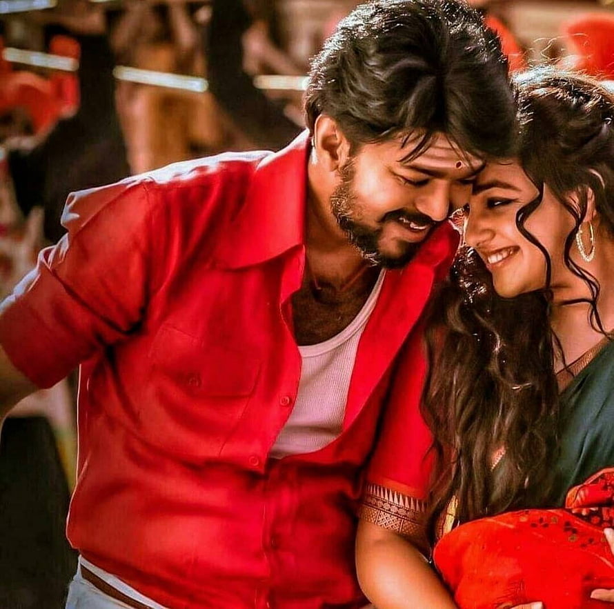 Vijay and Pooja Hegde in a romantic embrace from a Tamil film HD wallpaper