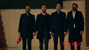 Four men in black suits standing together in a dramatic scene from the Turkish series Çukur HD wallpaper