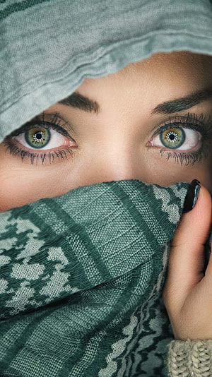 Close-up portrait of a woman wearing a patterned hijab with striking green eyes, Beautiful Eyes Girl, graphy hijab girl eyes HD phone wallpaper