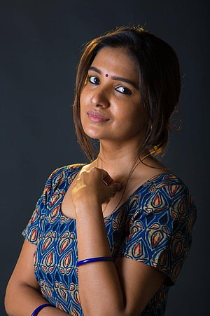 Vani Bhojan Portrait in Blue Patterned Top with Gold Necklace and Bangle HD phone wallpaper