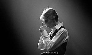 David Bowie as the Thin White Duke in a moody black and white portrait HD wallpaper