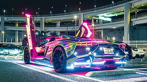 Rainbow Chrome Lamborghini Aventador with Neon Underglow at Night HD wallpaper