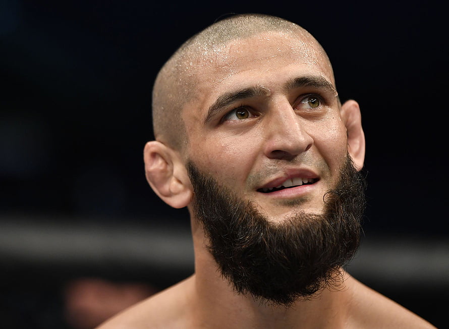 Khamzat Chimaev Close-Up Portrait in the Octagon with Focused Expression HD wallpaper