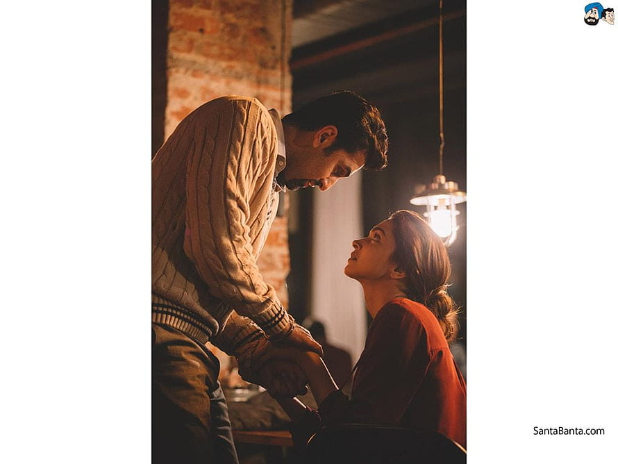 Tamasha Movie Still: Intimate Moment Between Two Characters in Warm Indoor Lighting HD wallpaper