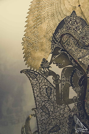 Traditional Indonesian Wayang Kulit Shadow Puppet with Intricate Carved Details HD phone wallpaper