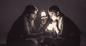96 Tamil Movie Still: Intimate Candlelit Moment Between Two Characters HD wallpaper