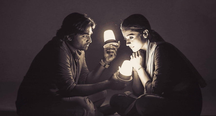 96 Tamil Movie Still: Intimate Candlelit Moment Between Two Characters HD wallpaper