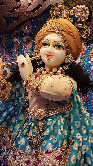 Banke Bihari Deity Idol Playing Flute in Ornate Temple Setting HD phone wallpaper
