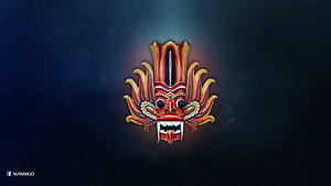 Traditional Sri Lankan Devil Mask with Fiery Red and Gold Details on Dark Background HD wallpaper