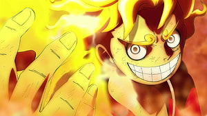Sun God Luffy Gear 5 Anime Character with Fiery Aura and Intense Expression HD wallpaper