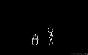 Minimalist Stick Figure Standing Beside a Desk Computer on a Black Background HD wallpaper