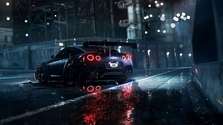 Nissan GT-R R35 Rear View on Wet Night Street with Red Taillight Reflections in Rain HD wallpaper