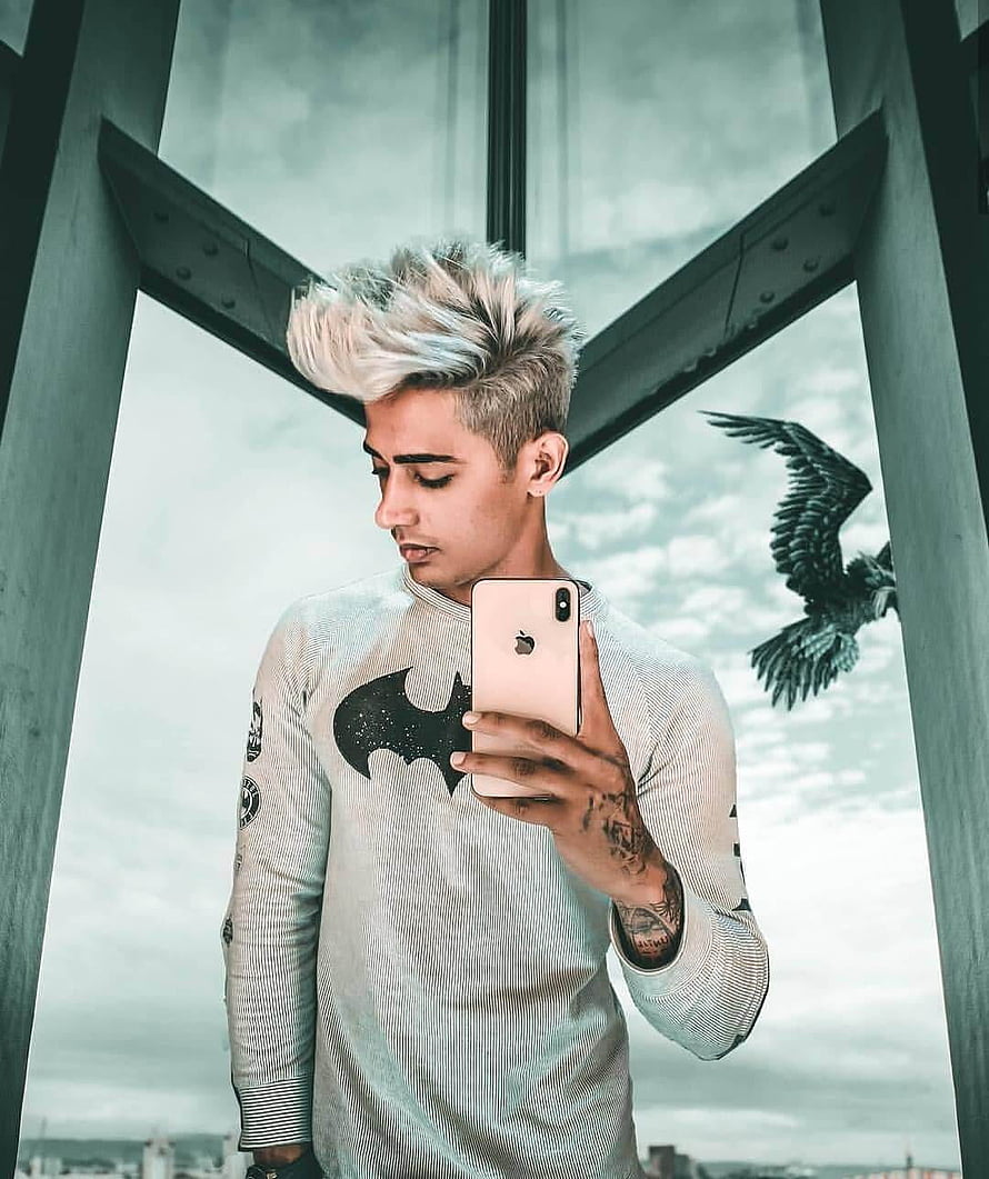Danish Zehen Taking a Mirror Selfie in a White Pinstripe Shirt with a Batman Logo HD phone wallpaper