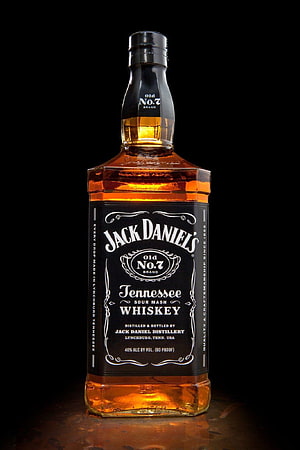 Jack Daniel's Old No. 7 Tennessee Whiskey Bottle on Dark Background HD phone wallpaper