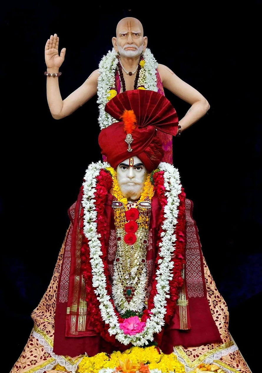 Shankar Maharaj Murti Adorned in Red Turban and Floral Garlands HD phone wallpaper