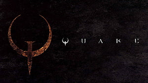 Quake Video Game Logo with Rusty Emblem on Dark Textured Background HD wallpaper