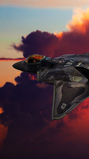 Stealth Fighter Jet Banking Through Dramatic Sunset Clouds HD phone wallpaper
