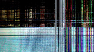 Close-up of a damaged LCD display showing colorful vertical pixel lines and screen artifacts HD wallpaper