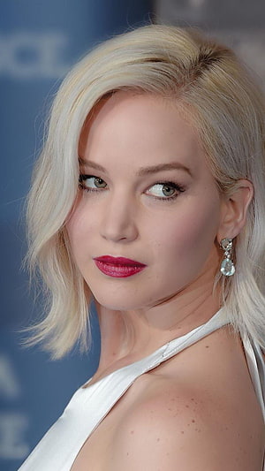 Jennifer Lawrence in White Halter Gown with Platinum Blonde Hair and Red Lipstick HD phone wallpaper