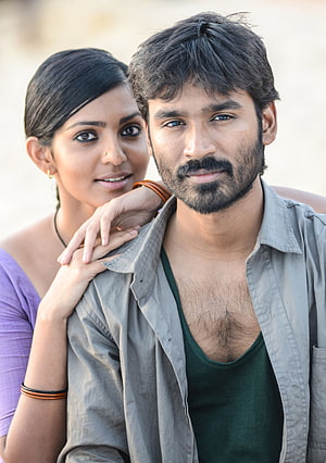 Dhanush and Female Co-Star in Intimate Portrait with Soft Natural Lighting HD phone wallpaper