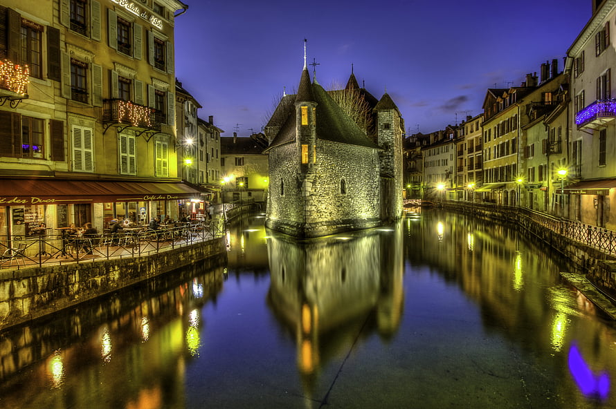 Ile de Beauregard in Annecy France at Night with Canal Reflections and Historic Architecture HD wallpaper