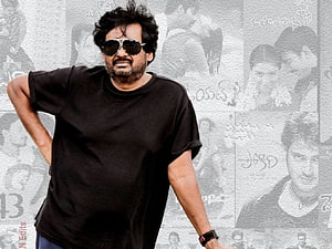 Puri Jagannadh in Black T-Shirt and Sunglasses with Film Collage Background HD wallpaper