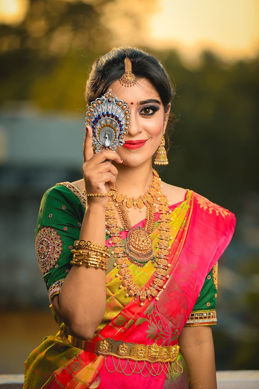 Elegant Indian Woman in Traditional Saree and Gold Jewelry Holding Decorative Mirror, Indian Jewellery, jewellery model HD phone wallpaper