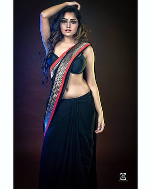 Simran Kaur in a Black Saree with Red and Gold Border HD phone wallpaper
